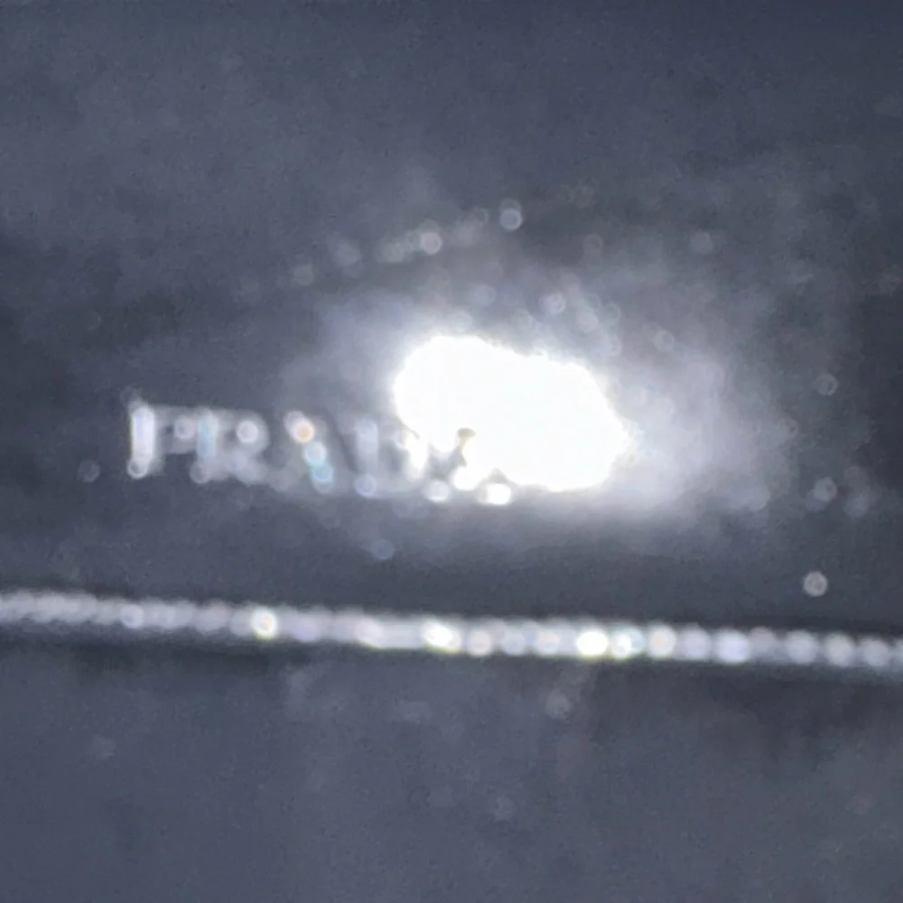 Prada Black Leather Wallet with‎ Minimalist Design